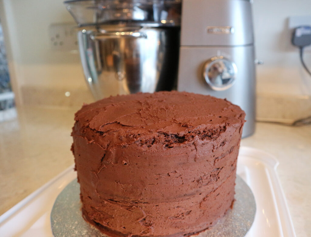 Roughly frosted chocolate cake